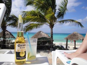 Enjoy Nachi Cocom's Sand, Sun and Sea and a cold Cerveza at Nachi Cocom Beach Club in Cozumel